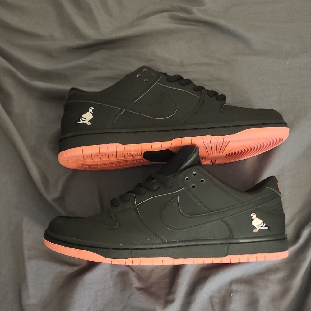 Nike Black and Orange Sneakers with Classic Design